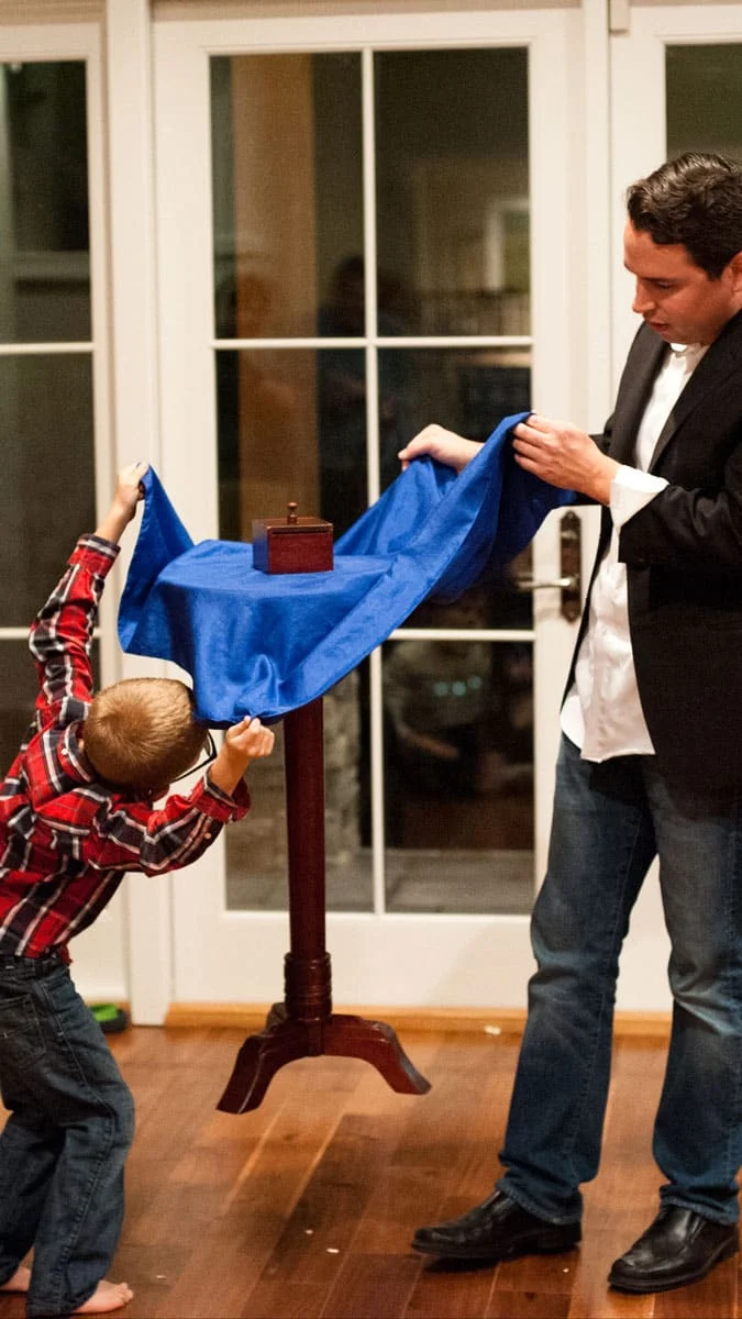 Floating-Table-Magic-Trick- birthday magicians near me